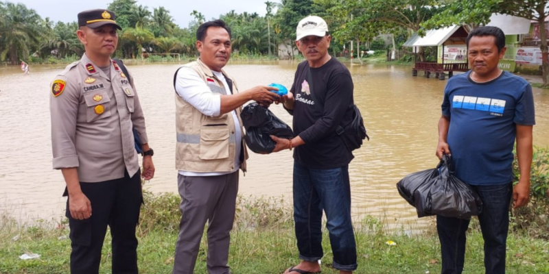 Akibat banjir yang melanda desa mereka sepekan terakhir, Puskesmas Benei cepat tanggap sesuai arahan Bupati Kuansing