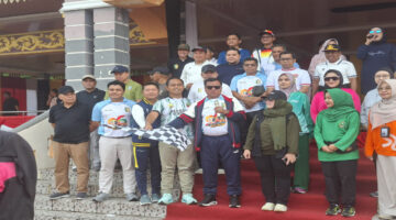 Ribuan Warga Kuansing Meriahkan Jalan Santai dan Pembukaan Festival Pacu Jalur 2025